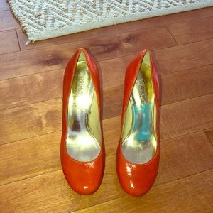 Michael by Michael Kors patent leather heel.